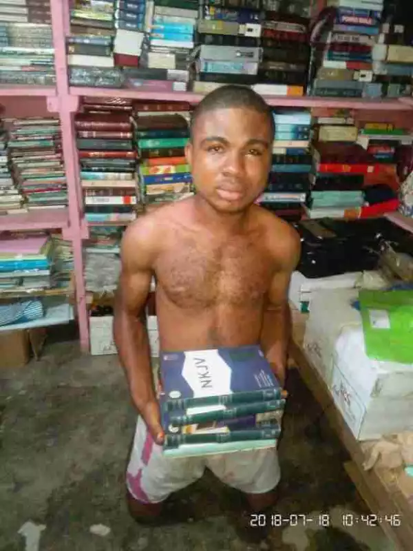 Young Man Caught Stealing Bibles At A Shop In Anambra State (Photo)